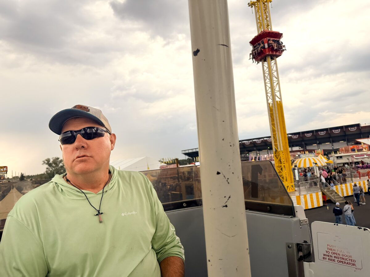 Troy Puls at the Albany County Fair carnival rides in Laramie, Wyoming