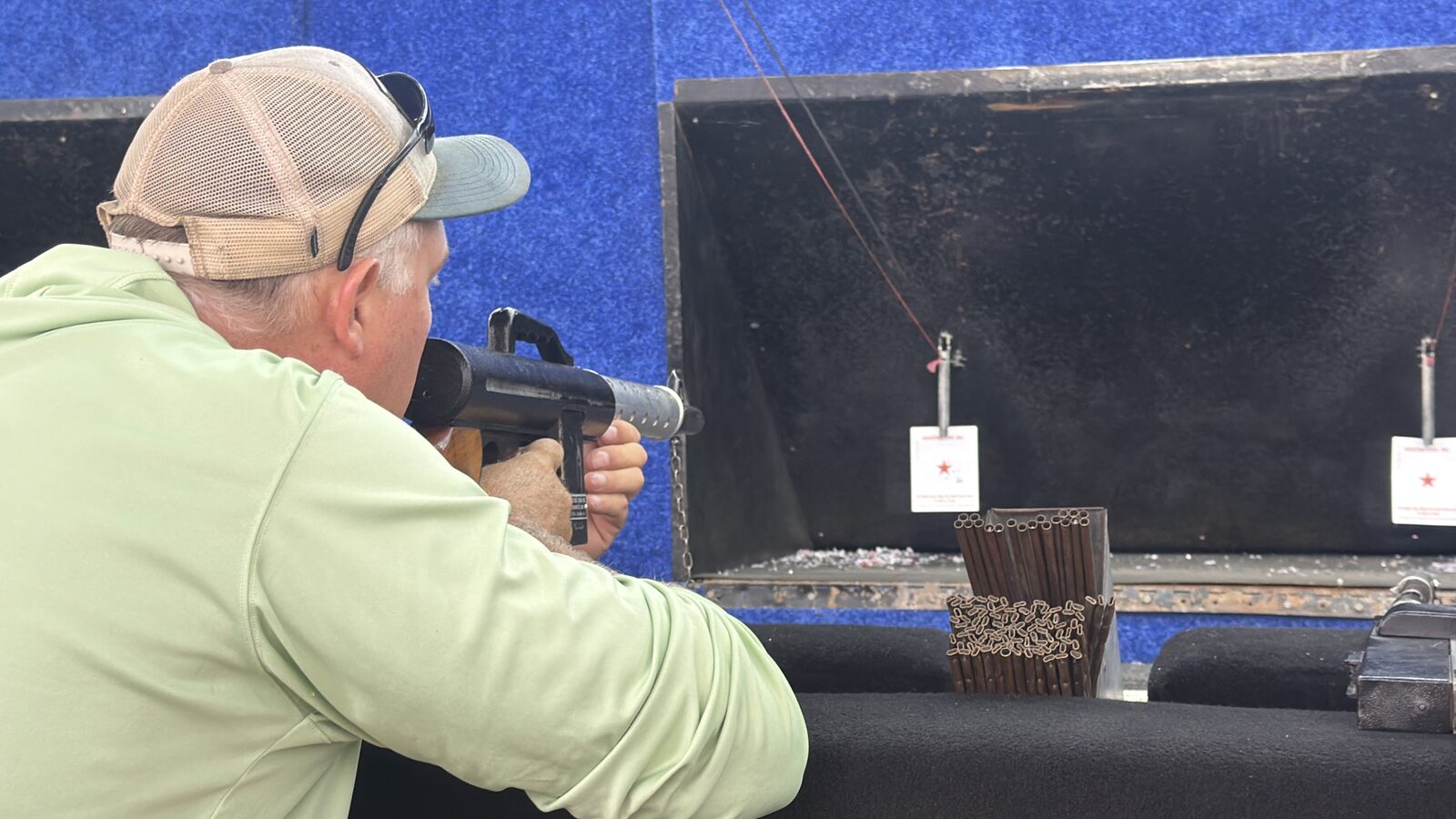 Troy Puls taking aim at a marksmanship game at the Albany County Fair